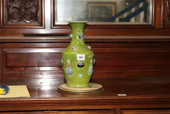A late 19th century Chinese vase with moulded vase decoration height 35cm